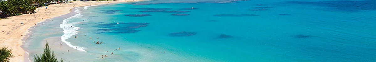 Enjoying the turquoise sea of Luquillo beach in Puerto Rico